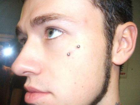 Green eyed cool guy with a face piercing face-piercing-5