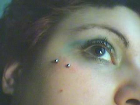 Extreme close up of a right side face piercing face-piercing-8