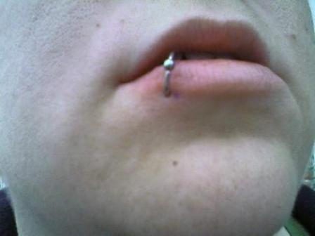 Ball ring pierced on side of lower lip lips-piercing-27