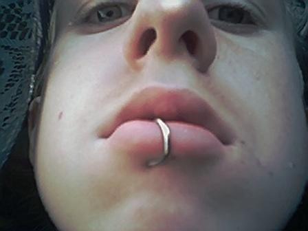 bottom lip piercing. Lower Center Lip Ring