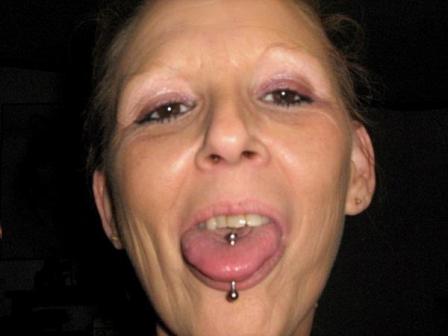 piercing your tongue. Woman Tongue Piercing