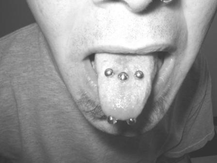 snake bite piercing tongue. Multiple Tongue Piercing