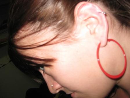 The best way to treat an ear piercing infection is simply to keep it as