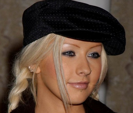 Christina Aguilera with ear, nose and labret piercing.