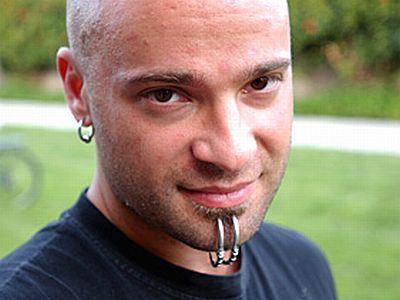 Dave Draiman – Facial Piercing. David Michael Draiman with his ear and chin 