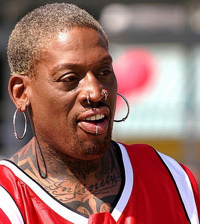 Basketball player Dennis Rodman with ear nose and lower lip piercings.