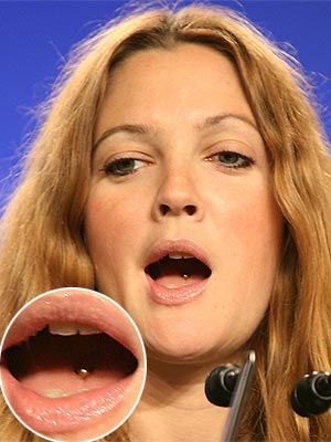Hollywood actress cum director and producer Drew Barrymore with tongue 