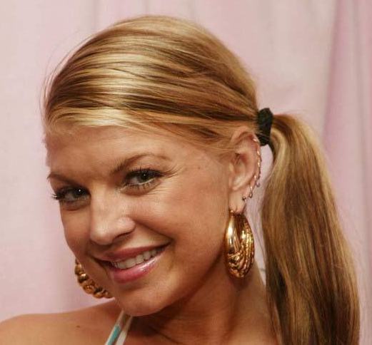 Star Fergie with her ear piercings. Fergie - Ear Piercing