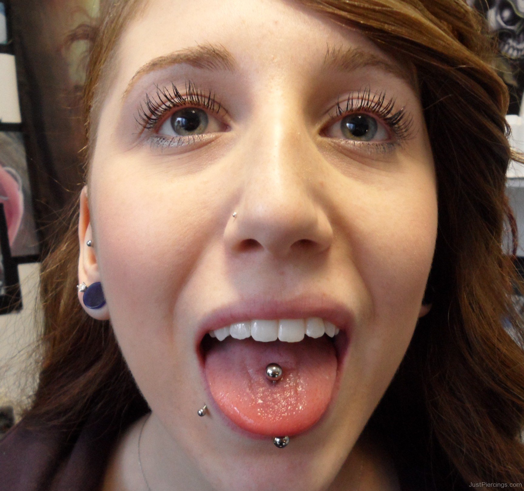 Labret And Vertical Tongue Piercing 