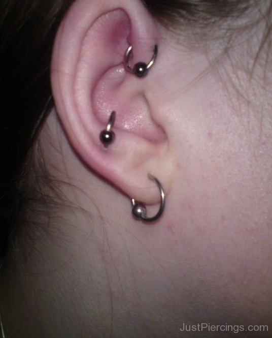 Anti Tragus Forward Helix And Lobe Piercing