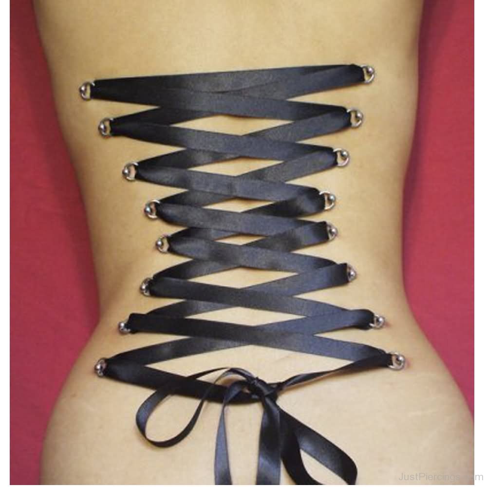 Corset Piercing With Black Ribbon 