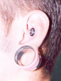 Flesh Tunnels In Different Ear Piercings