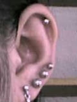 Wonderful Lobe And Helix Ear Piercings