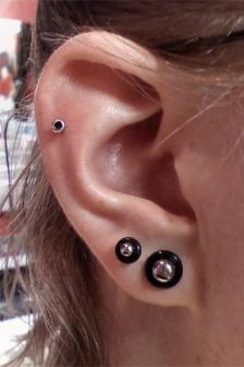 Dazzling Outer Conch And Lobe Ear Piercings
