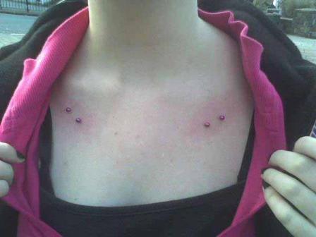 Girl Showing Her Clavicle Piercing