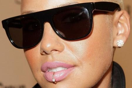 Amber Rose Lip And Ear Piercing