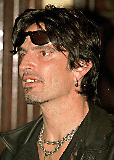 Tommy Lee Ear And Eyebrow Piercing