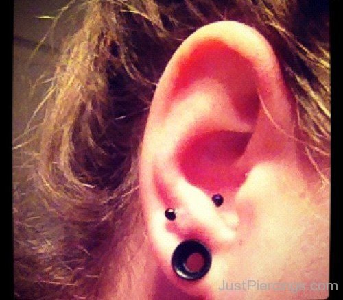 Anti Tragus Piercing With Black Barbell