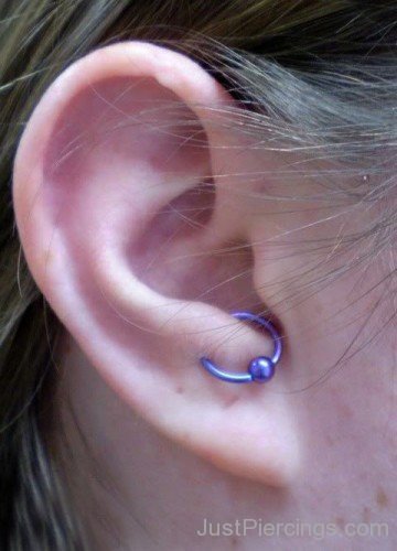 Anti Tragus Piercing With Blue Ball Closure Ring