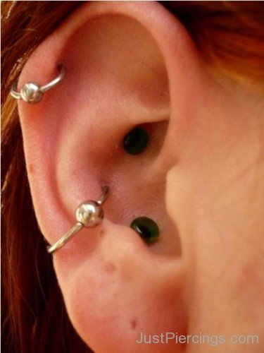 Conch Piercing With 2 Stud