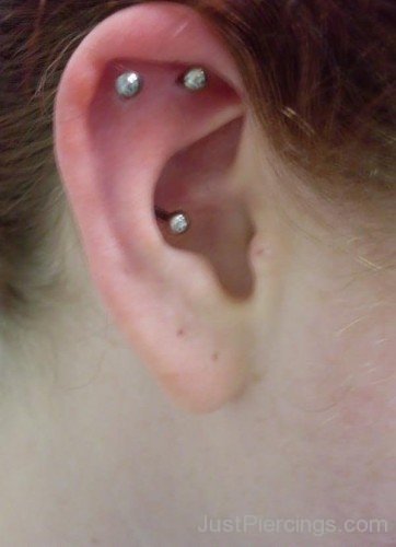 Double Helix And Inner Conch Piercing