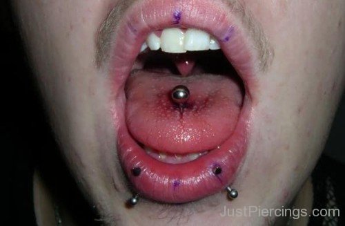 Lower Lip And Oral Tongue Piercings