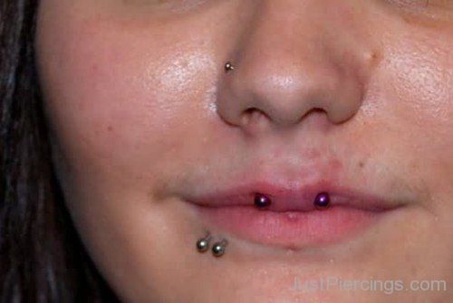 Nostril Shark Bites And Top Lip Piercing