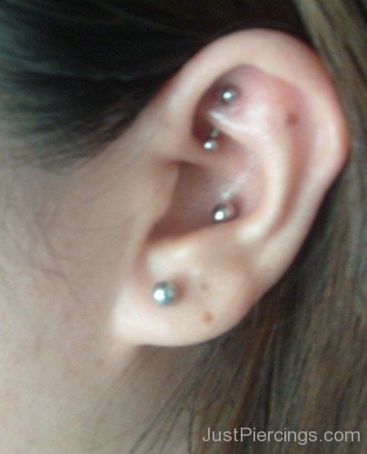 Rook Lobe And Conch Piercing