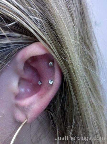 Snug Outer Conch And Lope Piercing