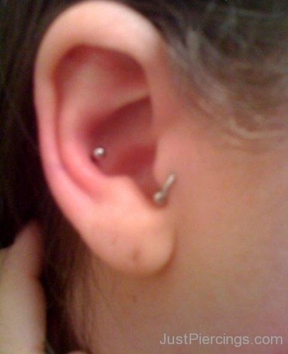 Tragus And Conch Piercing On Right Ear