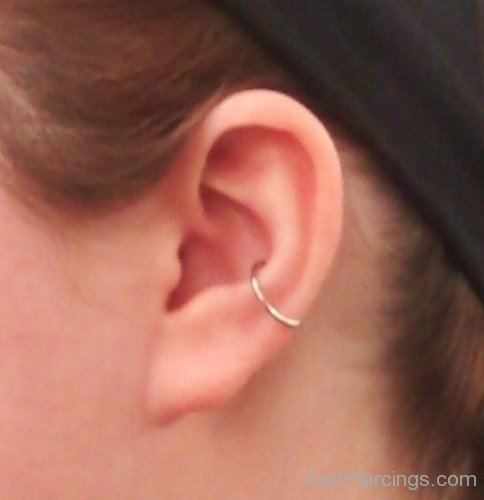 Conch Piercing With Gold Ring