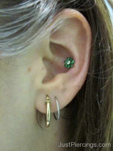 Conch Piercing With Green Stone Earing