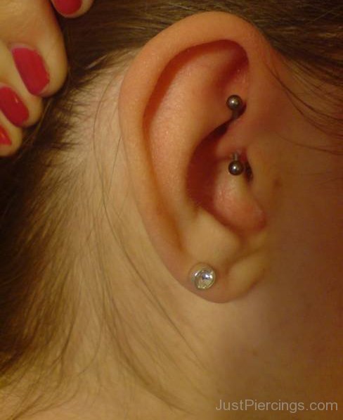 Daith Piercing with Banana Barbell and Lobe Piercing with Stud