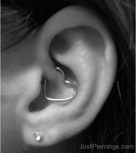 Daith Piercing with Heart Ring and Lobe Piercing with Diamond Stud