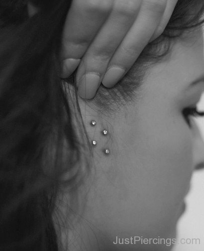 Double Surface Tragus Piercing