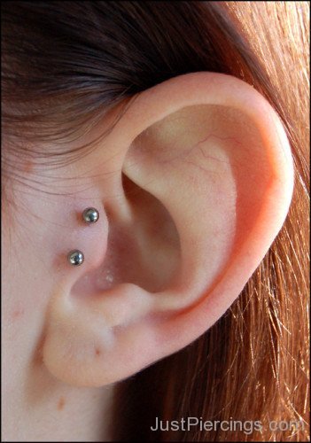 Double Tragus Piercings on Left Year