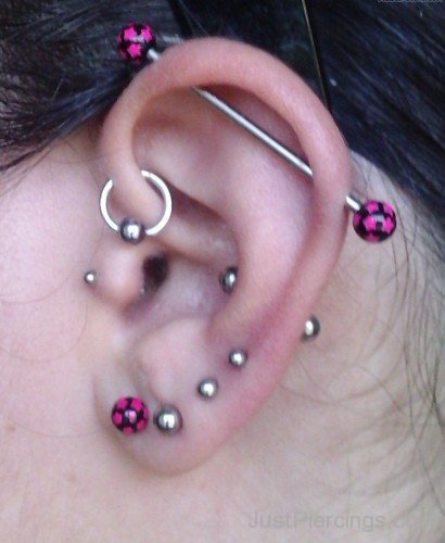 Industrial Anti Helix Conch And Lobe Piercing