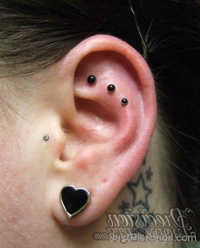 Lobe Piercing With Black Heart Earing