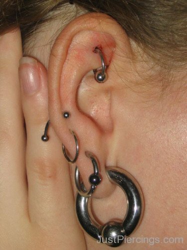 Lobe and Rook Piercing