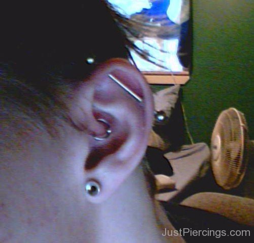 Right Ear Industrial and Daith Piercing