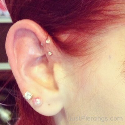 Dual Helix And Lobe Piercing