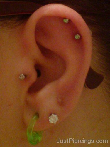 Dual Helix Tragus And Green Lobe Piercing