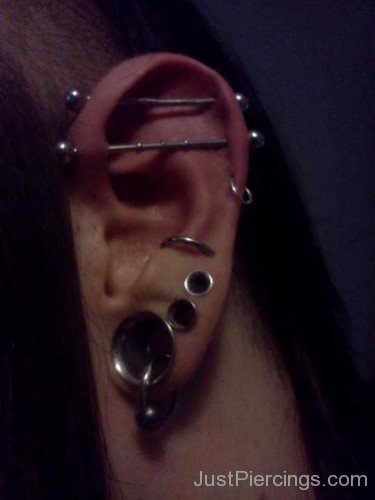Dual Industrial Helix And Lobe Piercing