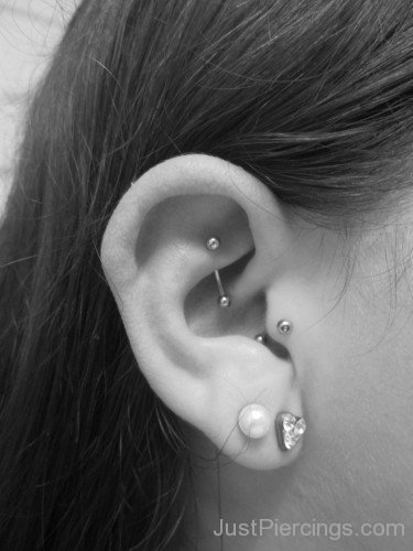 Heart Lobe Tragus And Rook Piercing