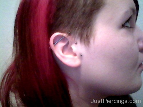 Industrial And Tragus Piercing