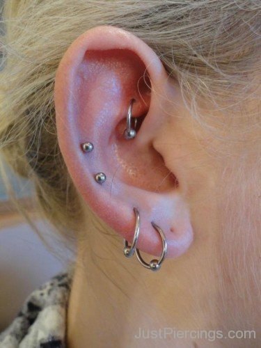 Lobe Dual Helix And Rook Piercing