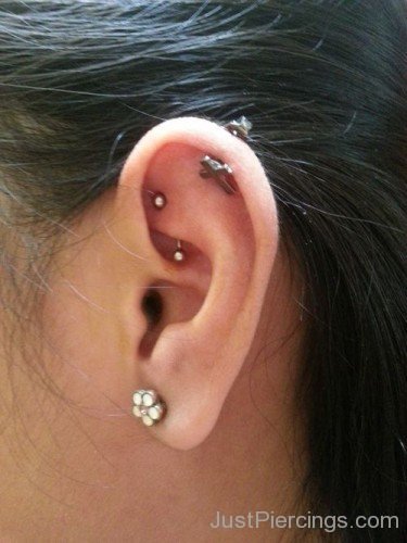 Lobe Flower Rook And Helix Piercing