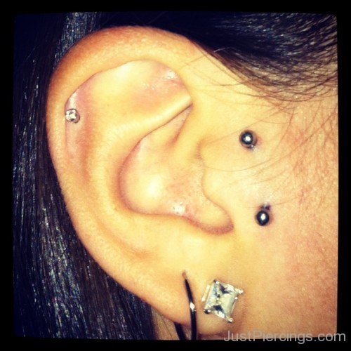 Lobe Helix And Tragus Piercing