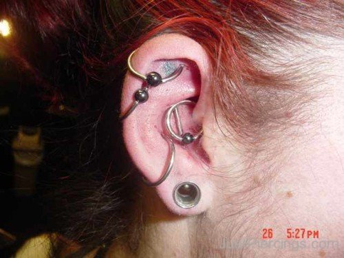 Lobe Helix Conch And Daith Piercing