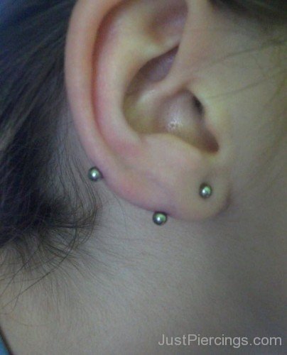 Lobe Piercing With Small Barbell